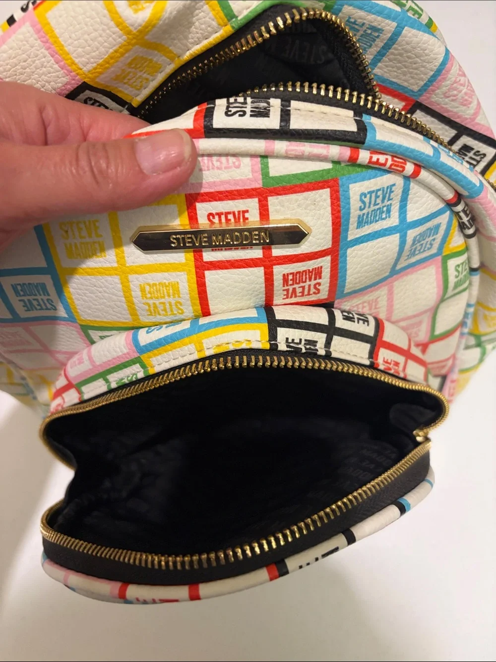 Steve Madden White Mini Backpack with Multicolor Logo Grid
